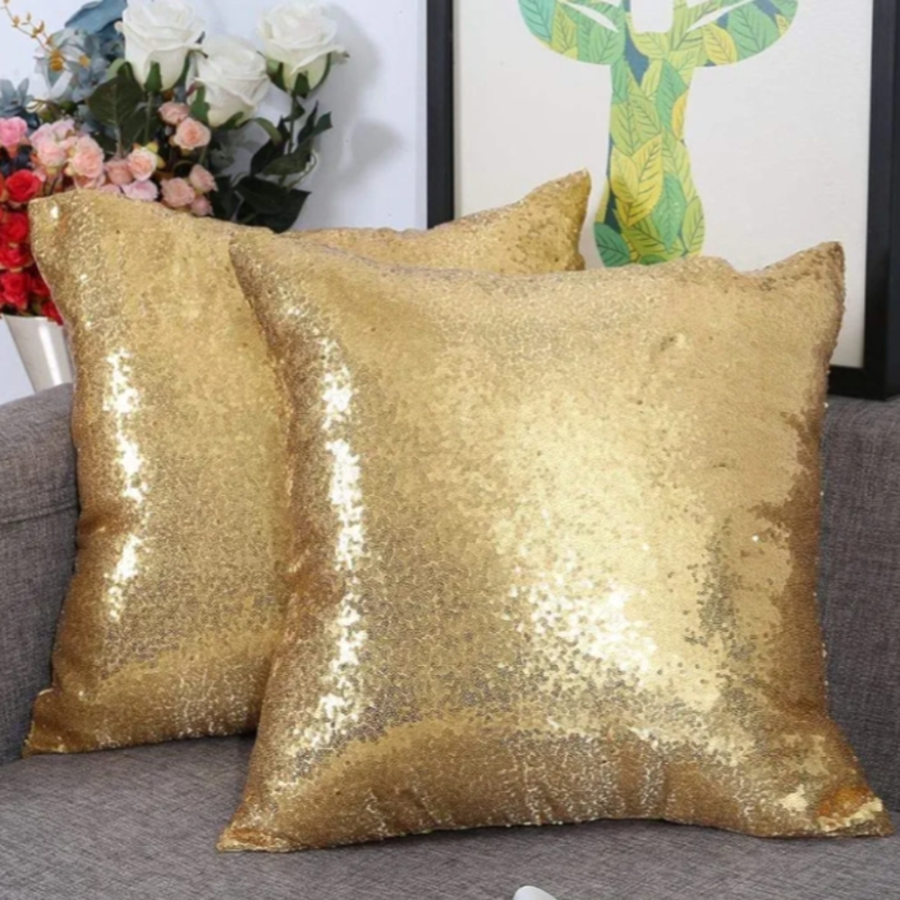 Pair of two gold sequin throw pillows. Happy to separate. Inserts included.